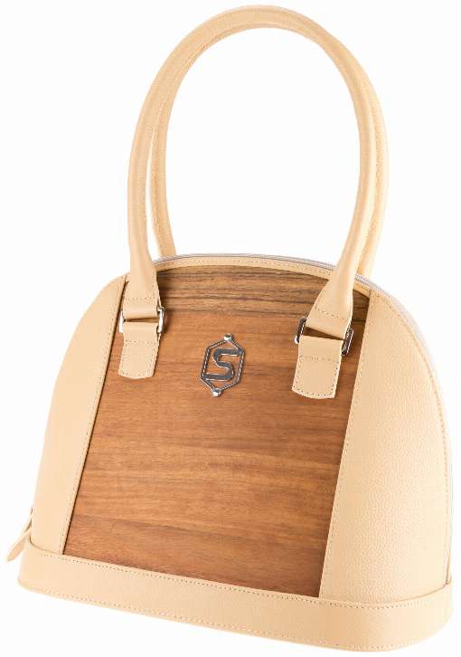 Bild 2: Ein luxuriser Hingucker fr jeden Anlass: Edle Damenhandtasche aus Leder und Furnier. Foto: Sebastian Sturm GmbH & Co. KG